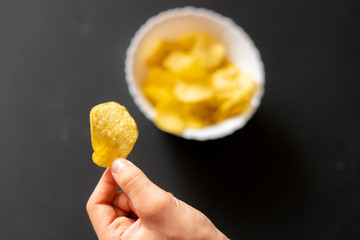 home made eco natural chips in the hand  f