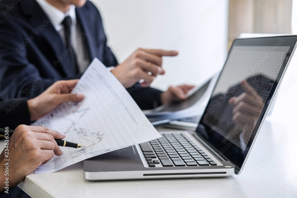 Poster Business team investment working with computer and analysis graph stock market trading with stock chart data, business and technology concept