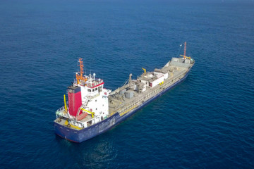 General cargo ship at sea - Aerial image