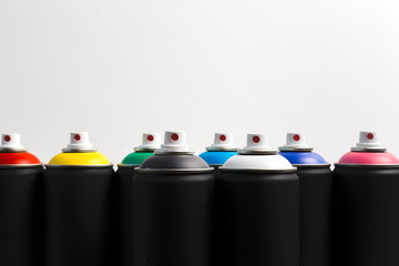 Spray paint cans close up