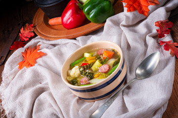 delicious autumnal vegetable soup with sausage and bacon