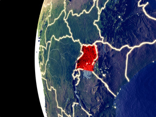 Night view of Uganda from space with visible city lights. Very detailed plastic planet surface.