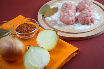 Prepare delicious cutlets with spices and onions.