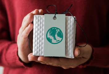 Green globe drawn on a gift box card