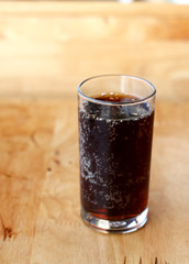 Glass cup of cola drink