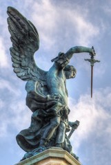 Bronze statue of Michael the Archangel, standing on top of St. Angelo's castle © S J Lievano