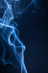 Abstract blue smoke swirls