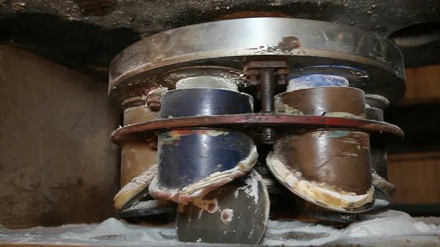 Conveyor bulk products.Salt packing at the enterprise.Old salt production in Drogobych.Ukraine.