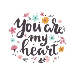 Fototapeta na wymiar Hand written lettering quote about love and relationship. Hand drawn lettering words you are my heart .Valentine day card on white background