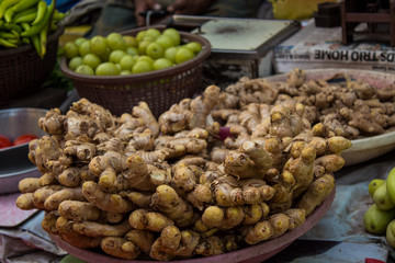 Indian street market: colorful fruits and vegetables; roads of Mumbai