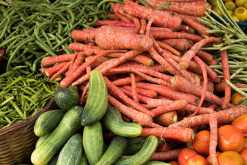 Indian street market: colorful fruits and vegetables; roads of Mumbai