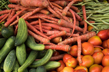 Indian street market: colorful fruits and vegetables; roads of Mumbai