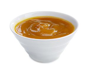 Tasty sauce in bowl on white background