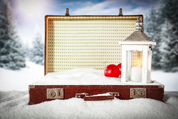 A winter suitcase full of snow in anticipation of Christmas   