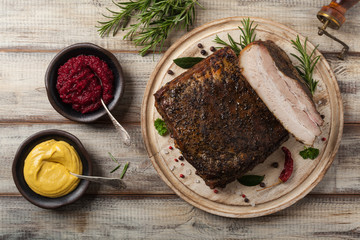 Baked whole pork bacon.