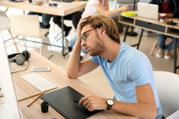IT specialist trying to meet deadline in office