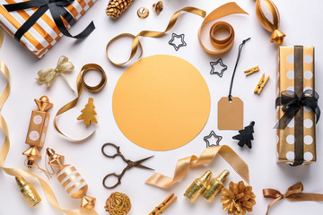 Beautiful composition with Christmas gifts, decorations and empty card on white background