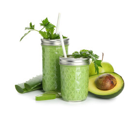Glasses of fresh aloe cocktail with parsley on white background