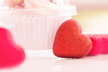 Valentines day concept, red decorate heart and dessert cup on sweet blurred background design for greeting card