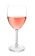 Glass of tasty wine on white background