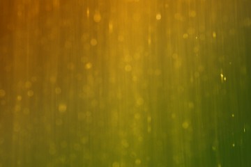 orange bright falling glitter long exposure texture - beautiful abstract photo background