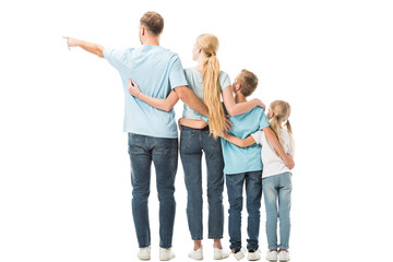 Back view of family hugging and looking somewhere isolated on white