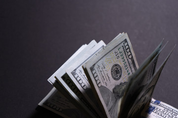 Close-up of money on black background