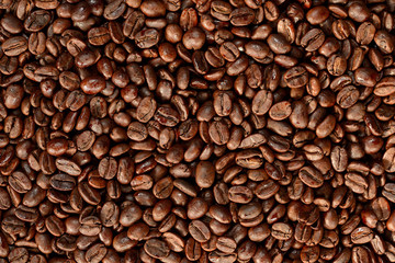 Roasted brown coffee beans pattern, background, top view