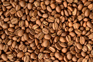 Roasted brown coffee beans pattern, background, top view