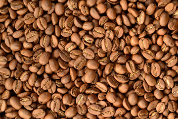 Roasted brown coffee beans pattern, background, top view