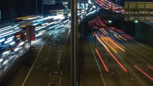 Busy Intersecting Freeway Time-Lapse of Rush Hour Traffic