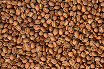 Roasted brown coffee beans pattern, background, top view