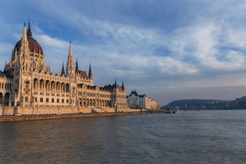 Fototapeta premium view from the ship on the building of the hungarian parliament on the blue sky background