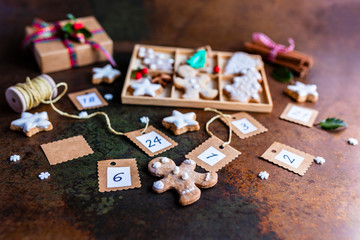 Homemade Christmas gingerbreads on vintage background.
