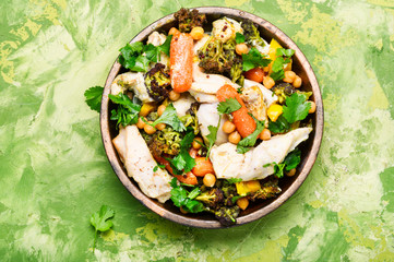 Chicken with vegetables and chickpeas in Indian