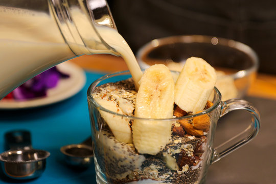 Healthy breakfast. Muesli, milk, honey and fruits
