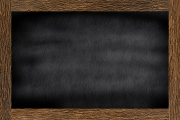 mockup of chalk board background texture with brown wood retro frame in classroom at the school for add your content or advertise or show product on display concept	
