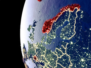 Night view of EFTA countries from space with visible city lights. Very detailed plastic planet surface.