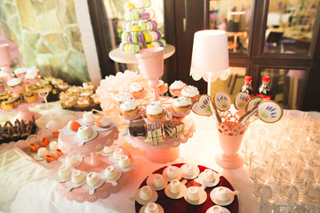 Different kinds of baked sweets on a buffet