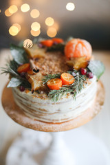 Christmas cake on a stand on the background