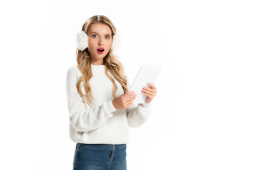 beautiful shocked girl using digital tablet isolated on white