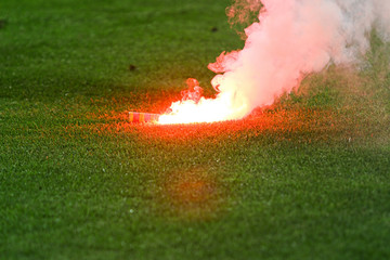 Smoke flare on soccer field
