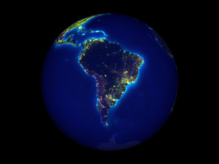South America on planet Earth at night from space. 3D illustration isolated on white background.