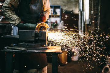  blacksmith working with metal