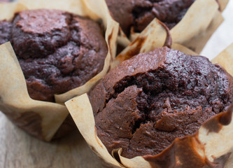 Homemade chocolate muffins in brown tulip muffin cases