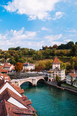 Fototapeta na wymiar Felsenburg castle and Untertorbrucke bridge over Aare river, Bern - Switzerland