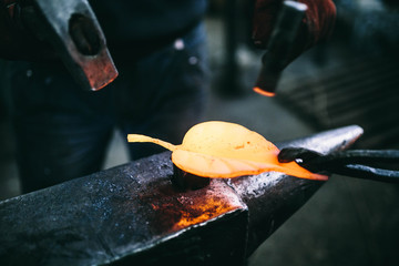  blacksmith working with metal