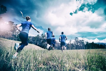 Fit people running in bootcamp