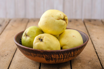 Quince on a dark background.