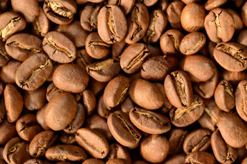 Obraz premium Roasted brown coffee beans pattern, background, top view